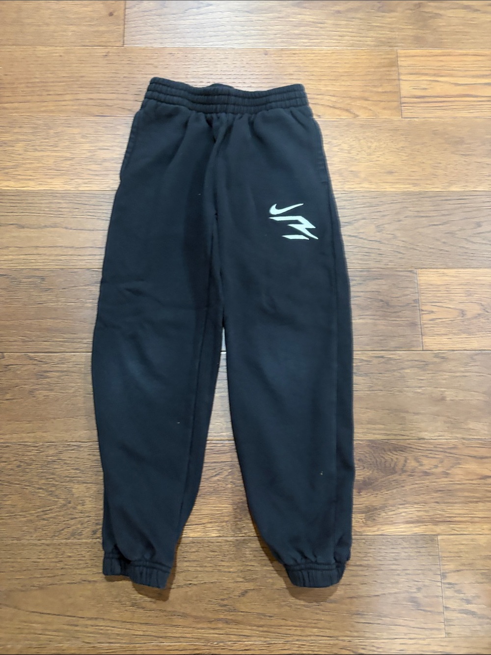 Nike Kids Black Sweat Joggers with White Swoosh